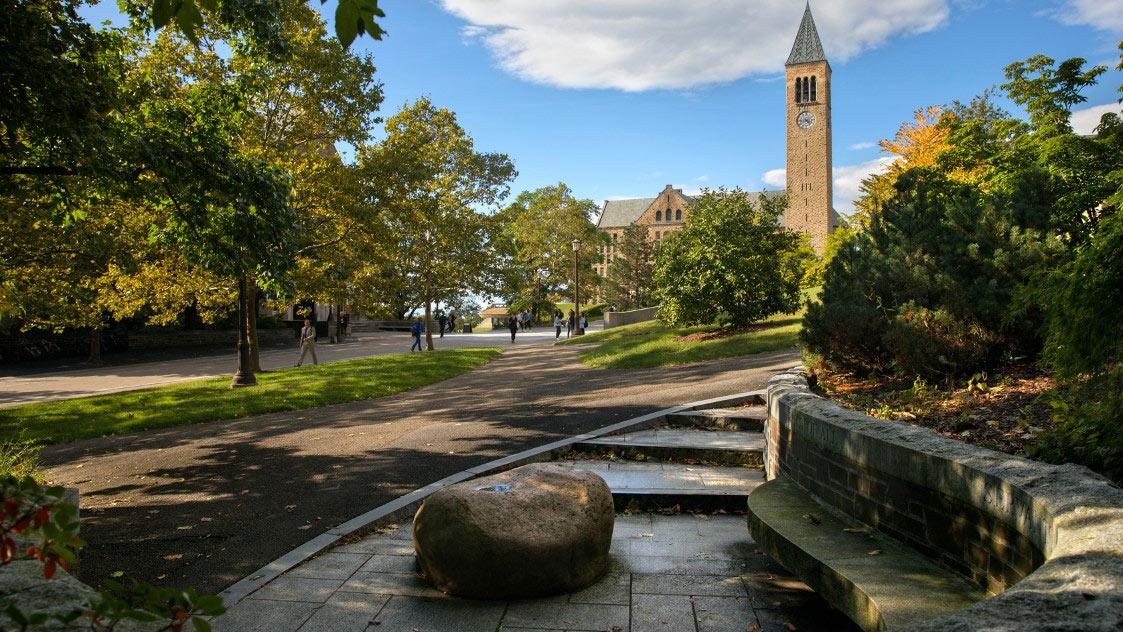 View of the Cornell clock tower from Ho Plaza in summertime